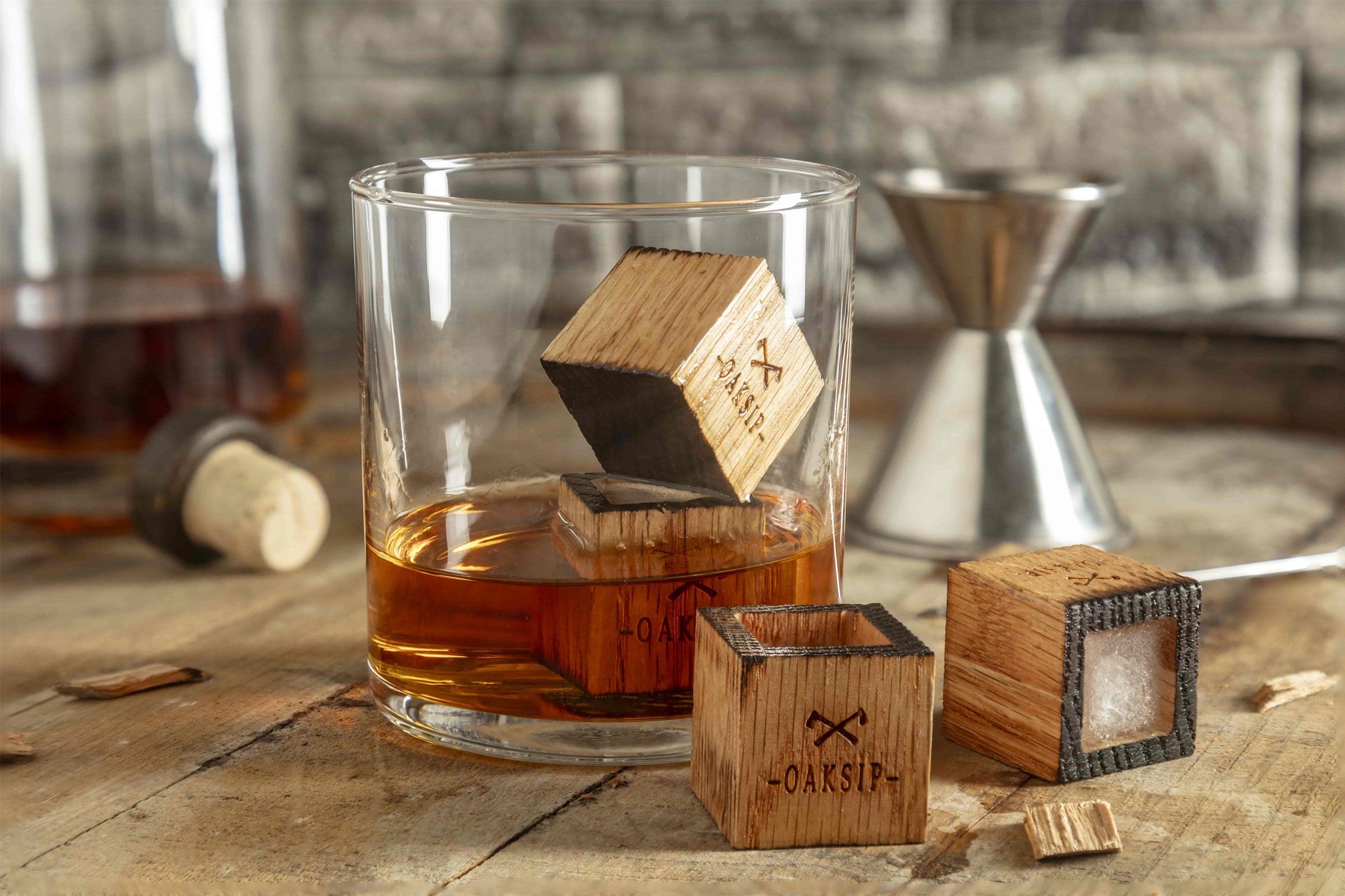 Charred oak whiskey stones - whiskey ice cubes in bourbon glass cup